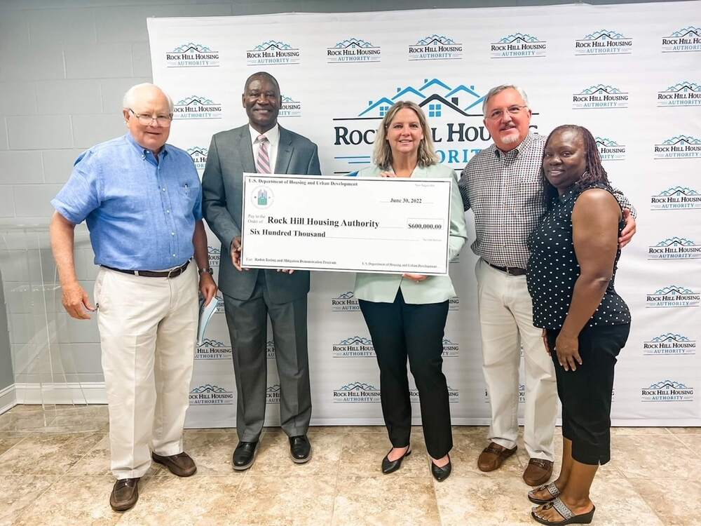 Rock Hill Housing Authority Receives HUD Radon Grant check. Pictured from L-R, Terry Millar, Board Chairman, Dewayne Alford, Executive Director, Kristine Foye, Director, Columbia (SC) Field Office, David Casey, Vice-Chairman, and Tammy Gordon, Board Member.