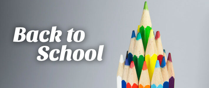 Back to School. Colored pencils gathered together to form a pyramid. 