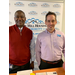 Executive Director Dewayne Alford and trainer John Emery in front of Rock Hill HA backdrop