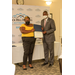 Martika Simpson accepts award from Dewayne Alford