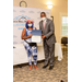 Tonya Taylor accepting an award from Dewayne Alford