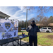 Man standing in front of the Rock Hill Police table