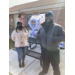 Man and woman standing in front of the Rock Hill Police table