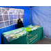 Woman sitting at the South Carolina Legal Services table