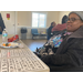 Resident at Aetna Health's Hello Spring Bingo Event