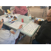 Residents having lunch and playing bingo at Aetna Health's Hello Spring Event