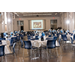  Tables and chairs set with balloons and decorations.  