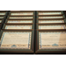  Rows of framed certificates.  