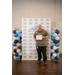   A man smiling and holding a framed certificate.  
