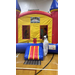  A woman monitoring kids in an inflatable bounce house. 