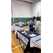  People talking by the Rock Hill Housing Authority table. 